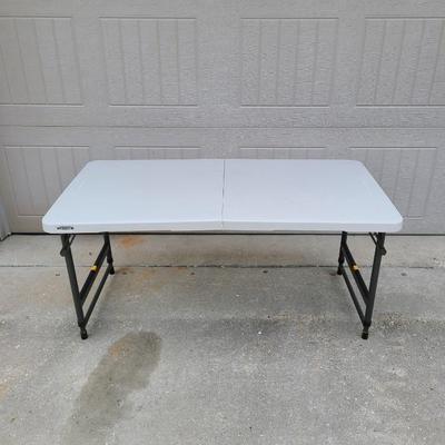 LIFETIME ADJUSTABLE FOLDABLE 4' x 2' Table | EstateSales.org