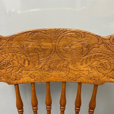 Vintage Spindel Back Cane Seat Dining Chair with Carved Dragon Details on Back Rest