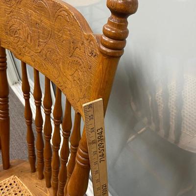 Vintage Spindel Back Cane Seat Dining Chair with Carved Dragon Details on Back Rest