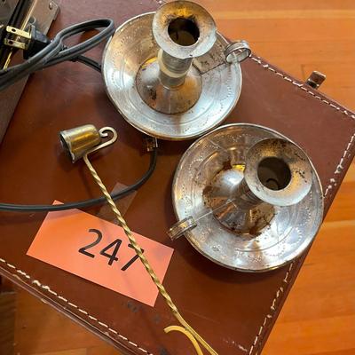 Primative Tin candlesticks.