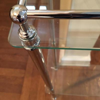 Chrome and glass shelf unit