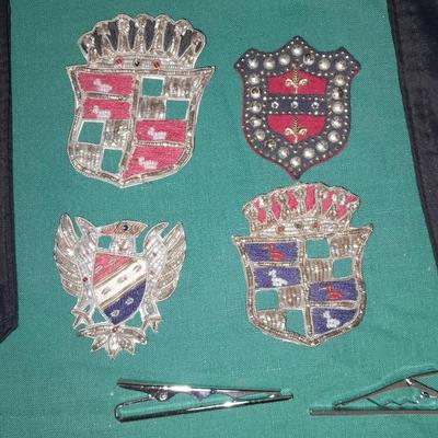 A pair of Epaulets , Tie clips, Pocket watch chain, Wallet, Vintage beaded Patches and more