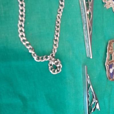 A pair of Epaulets , Tie clips, Pocket watch chain, Wallet, Vintage beaded Patches and more