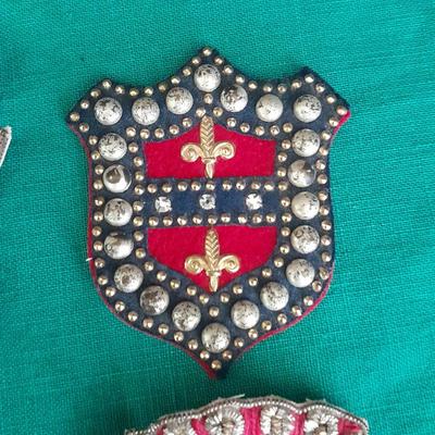 A pair of Epaulets , Tie clips, Pocket watch chain, Wallet, Vintage beaded Patches and more