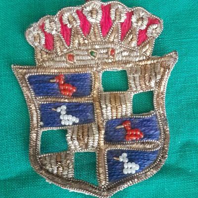 A pair of Epaulets , Tie clips, Pocket watch chain, Wallet, Vintage beaded Patches and more