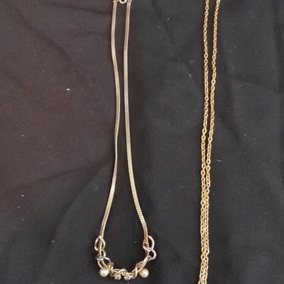 Two gold toned necklaces
