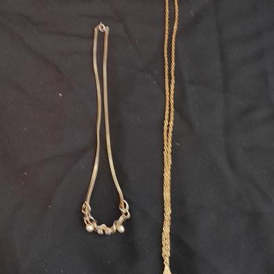 Two gold toned necklaces