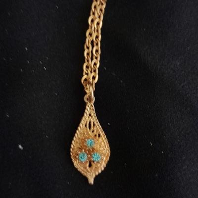 Two gold toned necklaces