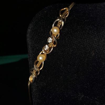 Two gold toned necklaces