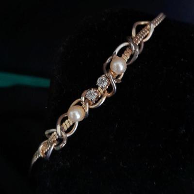 Two gold toned necklaces