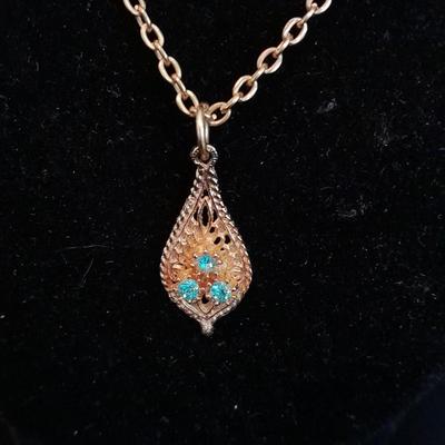 Two gold toned necklaces