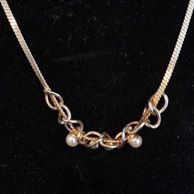 Two gold toned necklaces