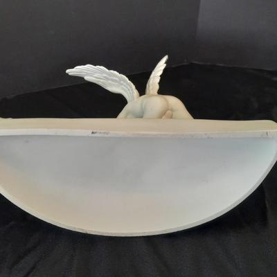 Black metal wall shelf with white Cupid and Psyche Statue