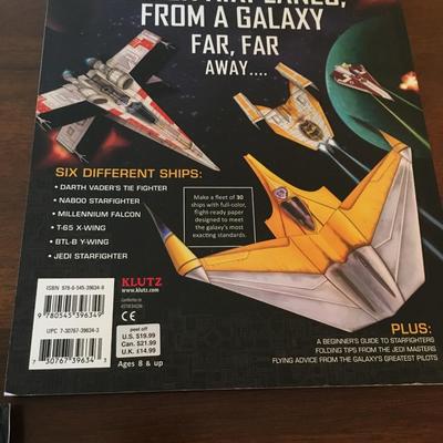 Star Wars collector cards and paper airplane book