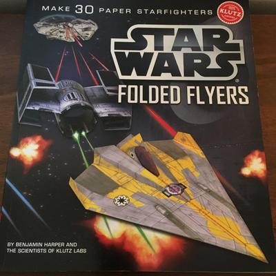 Star Wars collector cards and paper airplane book