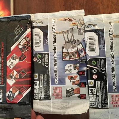 Star Wars collector cards and paper airplane book