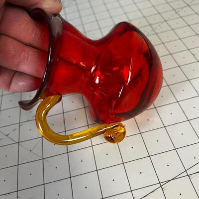 Hand Blown Glass Pitcher Orange/Red and Amber. 