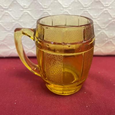 2 yellow mugshot glasses and New Mexico shot glass