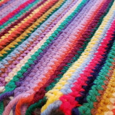 Striped hand crocheted afghan