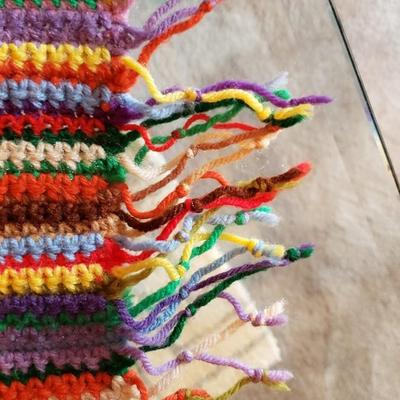 Striped hand crocheted afghan