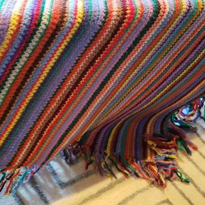 Striped hand crocheted afghan
