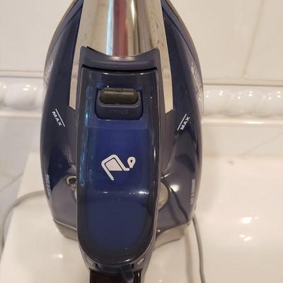 Clean Rowenta iron with cover