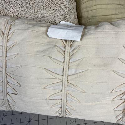 Pile of Decorative Throw Pillows