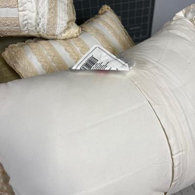 Pile of Decorative Throw Pillows