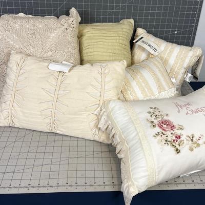Pile of Decorative Throw Pillows