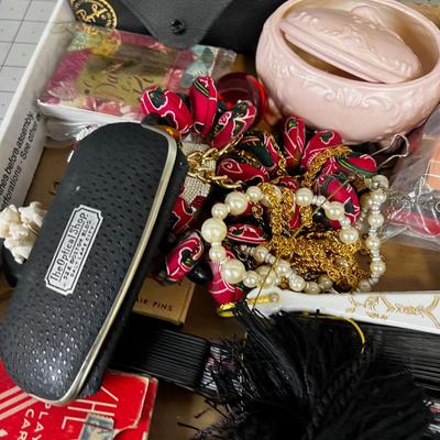 Drawer of Fun stuff: Fan, Jewels, Perfume, etc. 