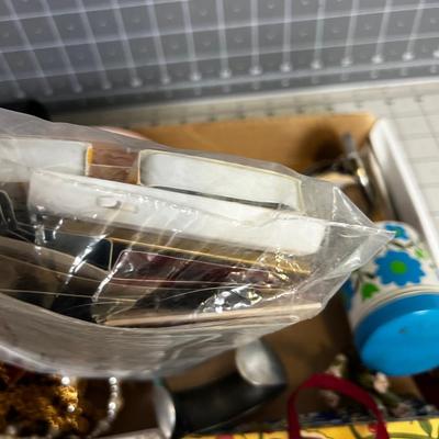 Drawer of Fun stuff: Fan, Jewels, Perfume, etc. 