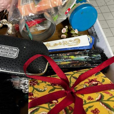 Drawer of Fun stuff: Fan, Jewels, Perfume, etc. 