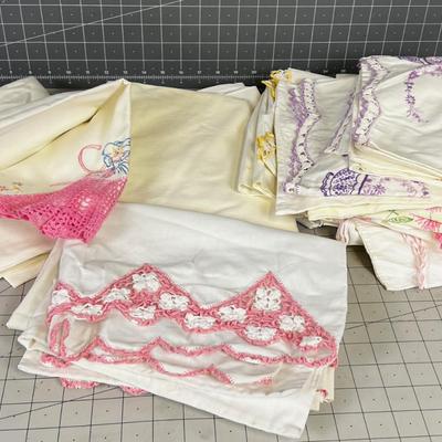 Stack of Crocheted Edge and Embroidered Pillow Cases