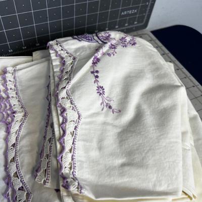 Stack of Crocheted Edge and Embroidered Pillow Cases