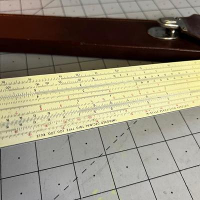 Slide Rule with Manuel And Case 