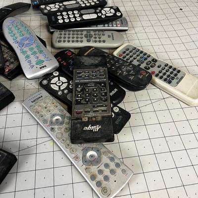 Pile of Remotes in a tub