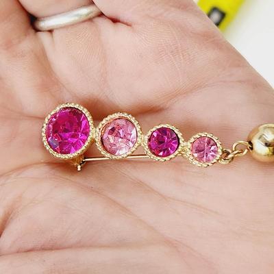 SARAH COVENTRY SASSY GOLD TONED PINK RHINESTONE TASSLED BROOCH