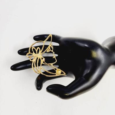 VINTAGE GOLD TONED WOMAN SILHOUETTE BROOCH