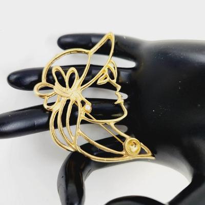 VINTAGE GOLD TONED WOMAN SILHOUETTE BROOCH