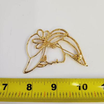 VINTAGE GOLD TONED WOMAN SILHOUETTE BROOCH