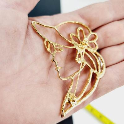 VINTAGE GOLD TONED WOMAN SILHOUETTE BROOCH