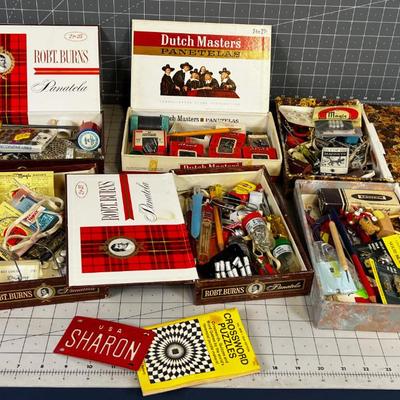 Cigar Boxes full of junk drawer clean outs. 