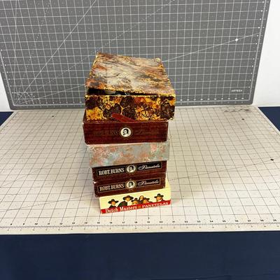 Cigar Boxes full of junk drawer clean outs. 