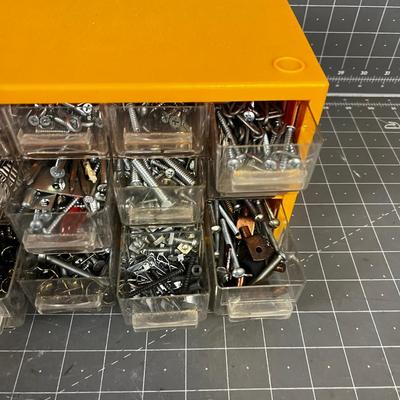 Cubby full of screws, nuts, bolts Plus more! 