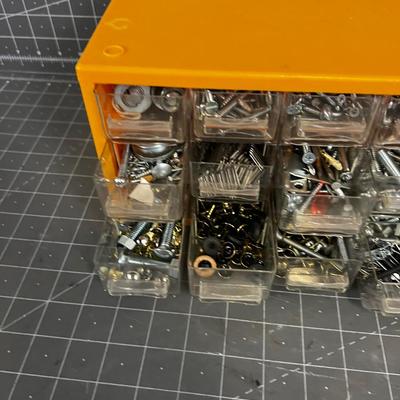 Cubby full of screws, nuts, bolts Plus more! 