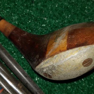 Bag of antique golf bags, some Spalding