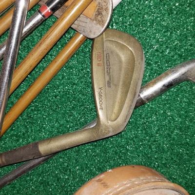 Bag of antique golf bags, some Spalding