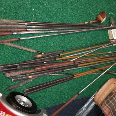 Bag of antique golf bags, some Spalding