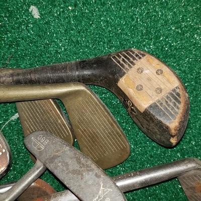 Bag of antique golf bags, some Spalding