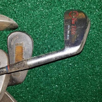 Bag of antique golf bags, some Spalding